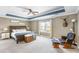 Primary bedroom features a tray ceiling, ceiling fan and sitting area at 1826 Towne St, Johns Island, SC 29455