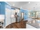 Kitchen featuring granite countertops, stainless steel appliances, and hardwood floors with eat in breakfast bar at 1826 Towne St, Johns Island, SC 29455