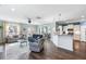 Expansive living room with natural light, connecting seamlessly to the dining area and modern kitchen at 1826 Towne St, Johns Island, SC 29455