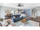 Comfortable living room with ceiling fan, open to the dining room and kitchen, providing a harmonious flow at 1826 Towne St, Johns Island, SC 29455