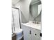 Modern bathroom featuring a shower and a vanity with brushed-nickel faucet at 1848 Merrick Dr, Round O, SC 29474