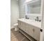 Bathroom featuring a double vanity with light gray cabinets and marble countertops at 1848 Merrick Dr, Round O, SC 29474