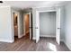Bright bedroom with a closet, wood-look floors, and ensuite bathroom access at 1848 Merrick Dr, Round O, SC 29474