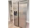 Stainless steel side-by-side refrigerator boasts ample storage in a modern kitchen at 1848 Merrick Dr, Round O, SC 29474