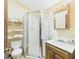 Compact bathroom offers a corner shower, vanity, and toilet at 1876 Chilhowee Dr, Johns Island, SC 29455
