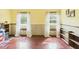 Spacious living room with hardwood floors and plenty of natural light at 1876 Chilhowee Dr, Johns Island, SC 29455