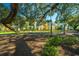 Beautiful community buildings with lush landscaping and mature trees at 1928 Chatelain Way, Mount Pleasant, SC 29464