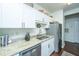 Clean kitchen with white cabinets, granite countertops, and stainless steel appliances at 1928 Chatelain Way, Mount Pleasant, SC 29464