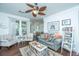 Cozy living room with stylish decor, comfortable seating, and bright natural light at 1928 Chatelain Way, Mount Pleasant, SC 29464