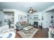 Bright living room featuring a fireplace, comfortable seating, nautical decor, and an open floor plan at 1928 Chatelain Way, Mount Pleasant, SC 29464