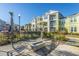 Community patio with fire pit and lounge chairs offering a comfortable outdoor space at 1928 Chatelain Way, Mount Pleasant, SC 29464