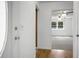 Inviting entryway showcasing hardwood floors and neutral paint, offering a glimpse into the spacious living area at 201 Miami St, Ladson, SC 29456
