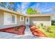 Inviting entrance to a single-Gathering home featuring fresh mulch and manicured landscaping near the front door at 201 Miami St, Ladson, SC 29456