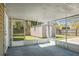 This is a covered screened porch with a shed and partially-fenced backyard at 201 Miami St, Ladson, SC 29456