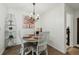 Cozy dining room with chandelier lighting and tasteful wall decor at 2011 N Highway 17 # 1100I, Mount Pleasant, SC 29466