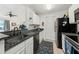 Well-appointed kitchen featuring granite countertops and modern appliances at 2011 N Highway 17 # 1100I, Mount Pleasant, SC 29466