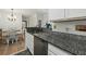 Modern kitchen with granite countertops, stainless steel appliances, open to dining area at 2011 N Highway 17 # 1100I, Mount Pleasant, SC 29466