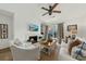Inviting living area featuring a cozy fireplace and ample natural light at 2011 N Highway 17 # 1100I, Mount Pleasant, SC 29466