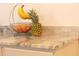 Kitchen island features a marble countertop with modern cabinets and contemporary fruit display at 208 Owens Dr, Summerville, SC 29485