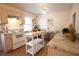 Cozy kitchen with stainless appliances, an island for prep work, and a round wooden table at 208 Owens Dr, Summerville, SC 29485