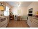 Bright kitchen featuring a dining table, sleek appliances, and wood flooring at 208 Owens Dr, Summerville, SC 29485