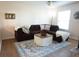 Comfortable living room with stylish sectional sofa, area rug, and ample natural light at 208 Owens Dr, Summerville, SC 29485