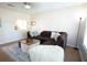 Relaxing living space with a large sectional, soft textures, and a cute furry friend at 208 Owens Dr, Summerville, SC 29485