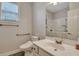 Clean bathroom featuring a walk-in bathtub, neutral color palette, and accessible fixtures at 215 Angora Way, Summerville, SC 29485