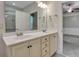 Bright bathroom with double sinks, vanity, tile flooring, and glass shower at 215 Angora Way, Summerville, SC 29485