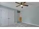 This is a bedroom with grey carpet, a ceiling fan, and a closet at 215 Angora Way, Summerville, SC 29485