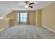 Spacious bonus room with a large window for natural light at 215 Angora Way, Summerville, SC 29485