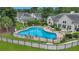 Inviting community pool surrounded by lounge chairs and lush landscaping at 215 Angora Way, Summerville, SC 29485