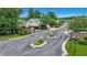 Welcoming community entrance with landscaped islands and brick signage at 215 Angora Way, Summerville, SC 29485