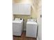Laundry room featuring modern appliances, tile floors and ample storage at 215 Angora Way, Summerville, SC 29485
