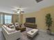 Inviting living room with modern decor, plush seating, and ample natural light at 215 Angora Way, Summerville, SC 29485