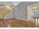 Spacious living room featuring beautiful hardwood floors, stairs and lots of natural light at 215 Angora Way, Summerville, SC 29485