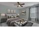 This is a main bedroom with a bed, window, and decorations at 215 Angora Way, Summerville, SC 29485
