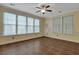Bright sun room with tile floors, many windows and a ceiling fan at 215 Angora Way, Summerville, SC 29485