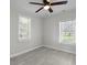 Bedroom featuring wood-look flooring, a ceiling fan, and a window at 2460 Surprise St, North Charleston, SC 29405