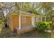 Traditional brick house with a covered front porch and green lawn, offering a comfortable and inviting living space at 2460 Surprise St, North Charleston, SC 29405