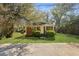 Classic brick home with a welcoming front porch and tidy lawn, ideal for relaxed living in a friendly neighborhood at 2460 Surprise St, North Charleston, SC 29405