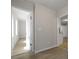 Hallway leading to rooms with modern flooring, fresh paint and white trim at 2460 Surprise St, North Charleston, SC 29405
