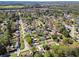Aerial view of the property set within a tree-lined neighborhood, highlighting its location at 2467 Birkenhead Dr, Charleston, SC 29414