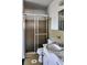 Compact bathroom featuring a glass shower enclosure and updated fixtures at 2467 Birkenhead Dr, Charleston, SC 29414