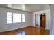 Inviting living room with hardwood floors and a bright window providing natural light at 2467 Birkenhead Dr, Charleston, SC 29414