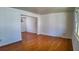Bright and spacious living room featuring gleaming hardwood floors and neutral paint at 2467 Birkenhead Dr, Charleston, SC 29414