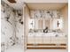 Stunning bathroom featuring marble countertops, dual sinks, and a spacious walk-in shower with luxury finishes at 304 Carolina Blvd, Isle of Palms, SC 29451