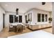Elegant dining area with seating for six, modern lighting, and custom cabinetry at 304 Carolina Blvd, Isle of Palms, SC 29451