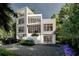 Stunning modern home with manicured landscaping, lush surroundings and an attached garage at 304 Carolina Blvd, Isle of Palms, SC 29451
