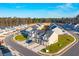 Expansive aerial view showcasing the well-planned community layout with lush greenery and convenient street access at 314 Green Fern Dr, Summerville, SC 29483